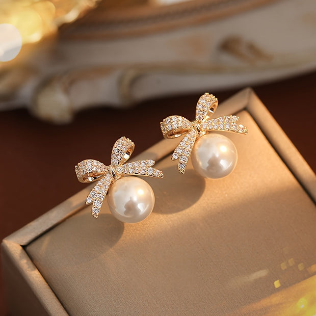Chic Vintage-Inspired Bow & Faux Pearl Stud Earrings with Sparkling Rhinestones - Perfect for Parties & Festivals - Luxe Ladies Moda