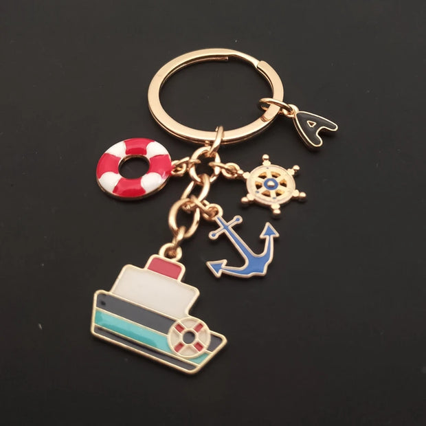 Creative Ocean Keychain – A-Z Letter Keychain with Enamel Anchor, Ship Steering Wheel, and Ship Model Pendant - Luxe Ladies Moda