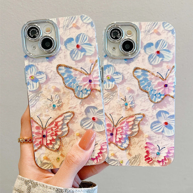 For iPhone 15 14 13 12 Pro Max 11 Fashion Blue Light Butterfly Flower Glitter Shockproof Phone Case with lens protective film - Luxe Ladies Moda