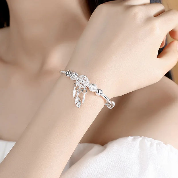 Dreamcatcher Tassel Silver Bracelet – Elegant Boho Jewelry with Dreamcatcher Charm and Tassels - Luxe Ladies Moda