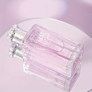 Floral Whispers: A Delicate Blend of Floral and Fresh Fruits, with Subtle Woody or Mossy Undertones, Creating a Fresh, Confident Ambiance - 100ml/3.4fl.oz.